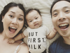 Baby wearing 'But First, Milk' onesie with mama and papa