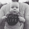 Baby wearing 'Hug Life' tee